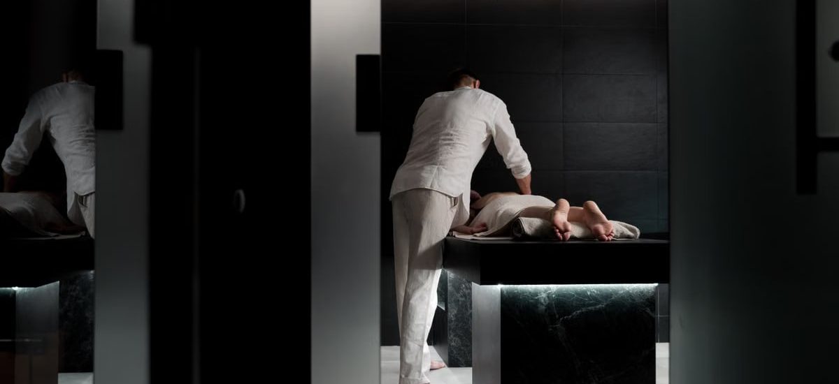 A relaxing massage in a modern spa room promoting wellness and self-care.