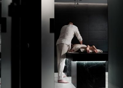 A relaxing massage in a modern spa room promoting wellness and self-care.